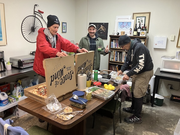 SVBE Volunteers having lunch in the kitchen at our 2025 Volunteer Celebration!