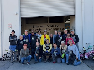 SVBE volunteers gathered on Thanksgiving 2025 for a group photo in front of our shop