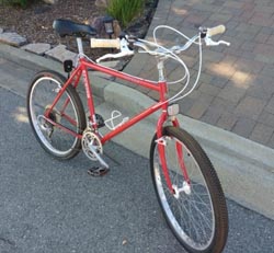 Refurbished 1986 Schwinn Sierra bicycle parked on the curb
