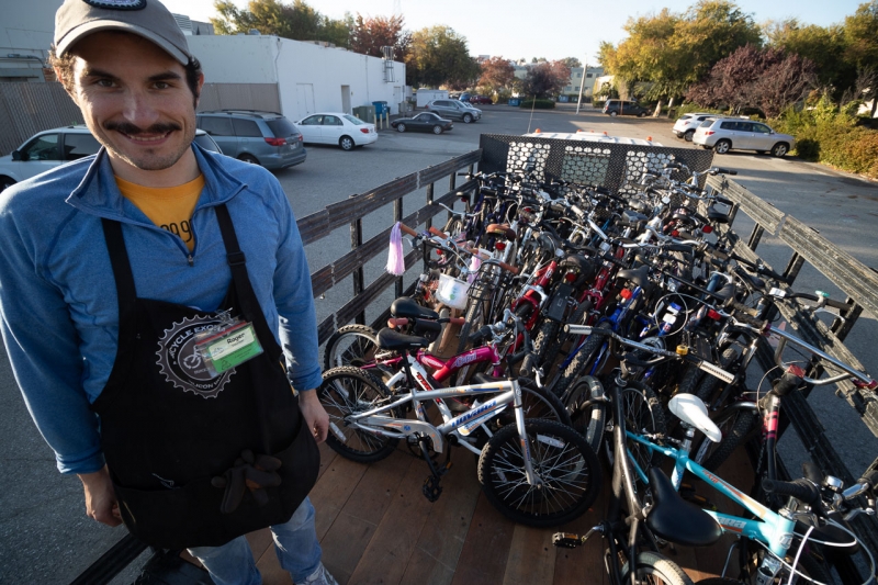 Roger, an SVBE volunteer, helps load a workday's worth of bikes are off to a nonprofit partner. photo: Andrew Yee