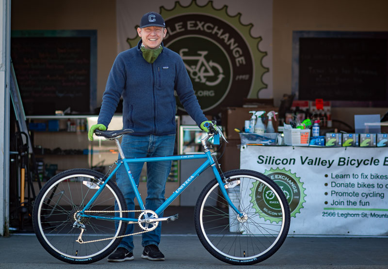 John Garrish with an updated, restored Univega mountain bike, one of his growing collection of 